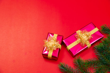 Christmas background concept. Top view of Christmas gift box gold balls with spruce branches