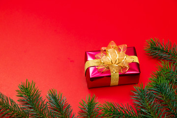 Christmas background concept. Top view of Christmas gift box gold balls with spruce branches