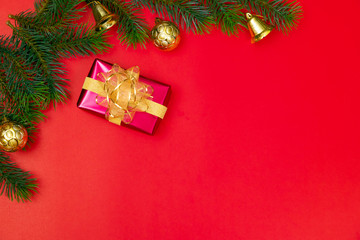 Christmas background concept. Top view of Christmas gift box gold balls with spruce branches