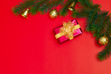 Fototapeta na wymiar Christmas background concept. Top view of Christmas gift box gold balls with spruce branches