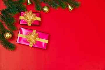 Christmas background concept. Top view of Christmas gift box gold balls with spruce branches