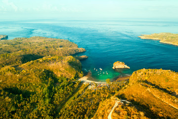 Aerial view, on Crystal bay with scenery boat and crystal clear sea lagoon and beautiful island in...
