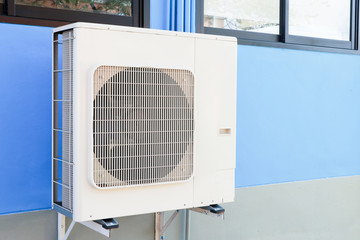 Air conditioner compressor outside unit.