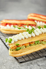 Assembly of Ecklers with Cheese, Curd Cheese, Avocado and Shrimp