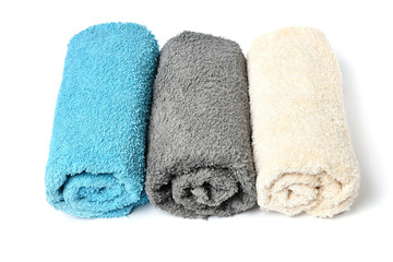 Obraz na płótnie Canvas Set of soft spa towels on white background, top view