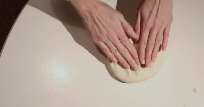 Girl In The Striped Apron Kneading Dough