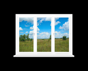 Window isolated on black background with view to summer field. Rural view
