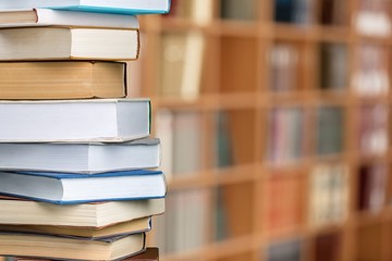 Books collection in pile on  background.