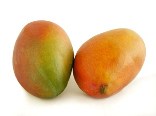 mangoes and oranges ,juice or smootie as wholesome food