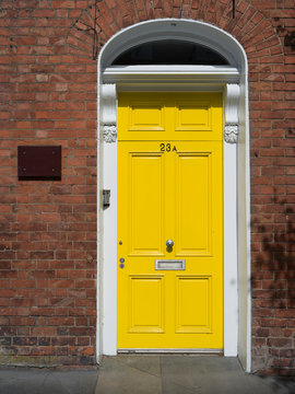 Closed yellow door of a house, Londonderry, Northern Ireland, Ireland