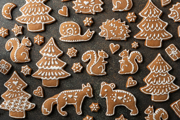 Homemade Christmas gingerbread cookies on a dark background