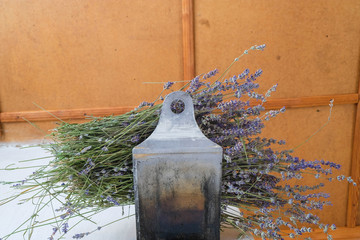 Retro stove smoked damper with dry lavender on top.