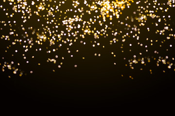 Abstract background,gold glitter and silver wink stars on black background,celebration for...