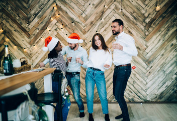 Obraz na płótnie Canvas Lovely friends dancing on Christmas party