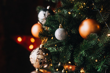 Obraz na płótnie Canvas Christmas decorations with a Christmas tree in the interior
