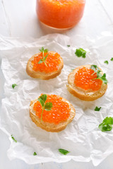 Sandwiches with red caviar