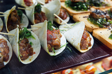 A wide variety of traditional tapas with seafood in Spain at the San Miguel market