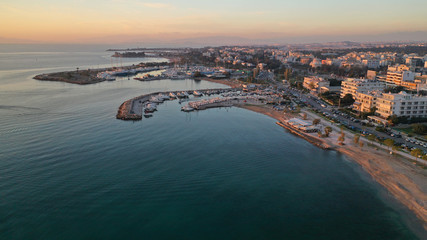 Aerial drone photo of port of famous district of South Athens riviera - Glyfada at sunset, Attica, Greece