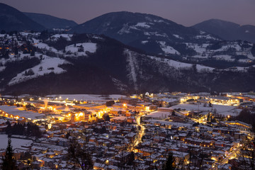 city ​​lights from the mountain. winter season. Alpi Orobie. The Seriana valley Bergamo Italy.