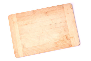 Wooden cutting board isolated on white background