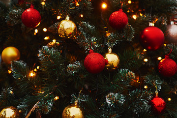 Obraz na płótnie Canvas Christmas and New Year decorations with warm lights. Concept and background.