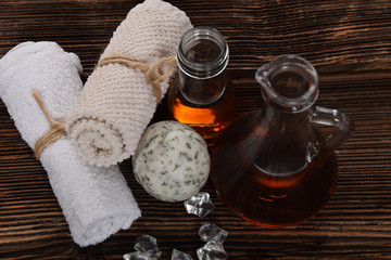 Obraz na płótnie Canvas Musky aroma soap, argan oil for the body and clean towels