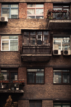 Display of a house in the windows of an old building.