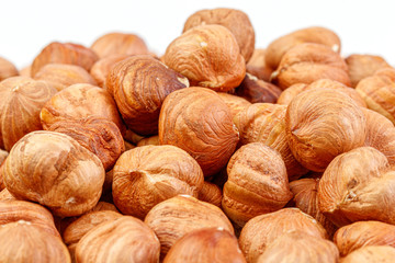 macro hazelnuts nuts on a white background