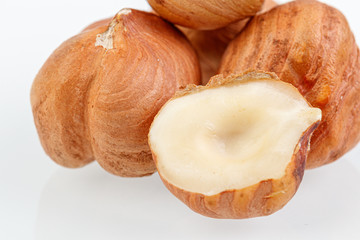 macro hazelnuts nuts on a white background