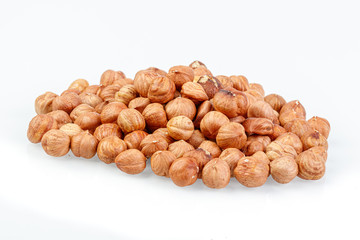 macro hazelnuts nuts on a white background