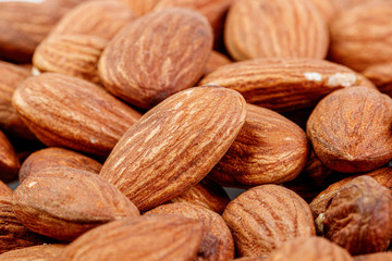 macro almond nuts on a white background