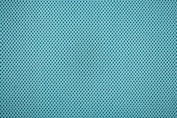 Close up of teal blue colored mesh textile fabric