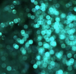 Bokeh lights blurry turquoise color.