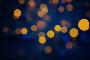 Abstract christmas new year bokeh lights blue background.