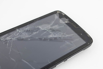 Broken screen mobile smartphone isolated on white background.