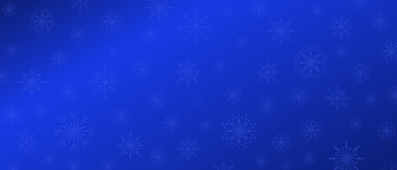 Christmas background with big and small snowflakes in blue background. Winter banner with copy space.