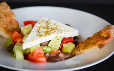 delicious greek salad with fresh ingredients & spices