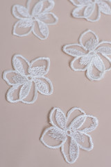Texture lace fabric. lace on white background studio. thin fabric made of yarn or thread. a...
