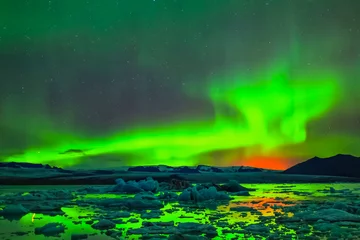 Papier Peint photo Kirkjufell Aurora borealis in night northern sky. Ionization of air particles in the upper atmosphere.