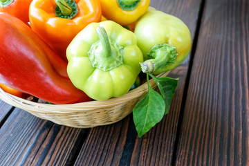 bell peppers on wooden background