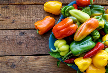 bell peppers on wooden background