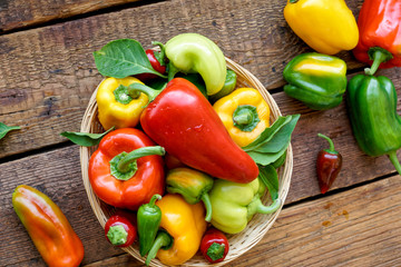 bell peppers on wooden background