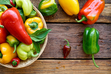 bell peppers on wooden background