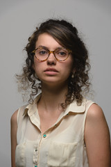 portrait of young woman in glasses