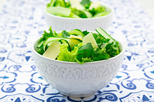Pea and cucumber salad on patterned table