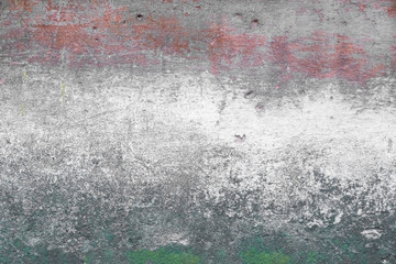 Abstract texture of old colorful wall with grain and scratches. Beautiful, artistic, creative background. White, grey, green and red rough weathered stone texture. Copy space	