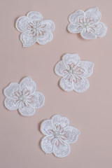 Texture lace fabric. lace on white background studio. thin fabric made of yarn or thread. a...