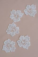 Texture lace fabric. lace on white background studio. thin fabric made of yarn or thread. a...