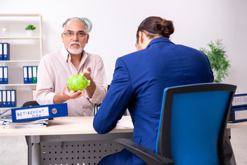 Financial advisor giving retirement advice to old man
