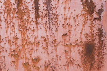 Rusty orange background. Rust texture on an old metal wall. Grunge rusted metal texture. Rusty corrosion and oxidized background. Worn metallic iron panel